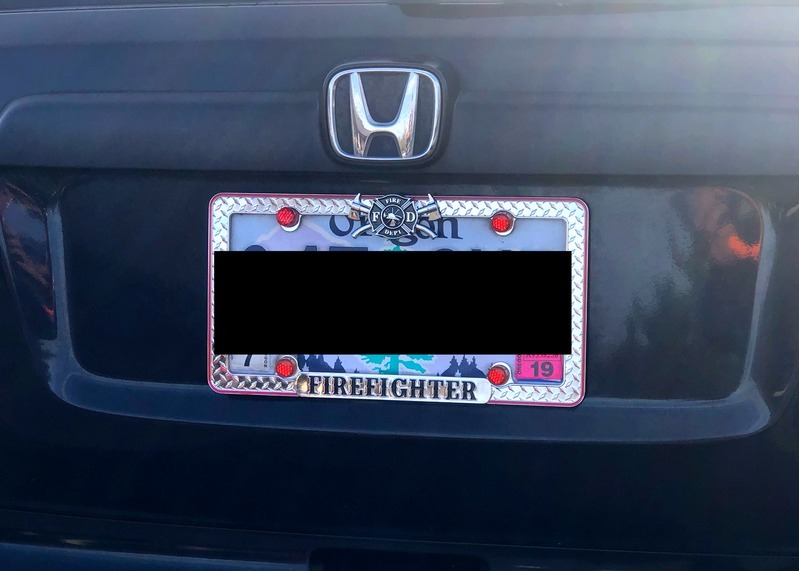 Karen's photograph of their Firefighter Chrome License Plate Frame